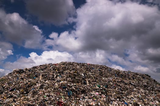 Landfill With Cumulus Clouds, landscape with garbage dump