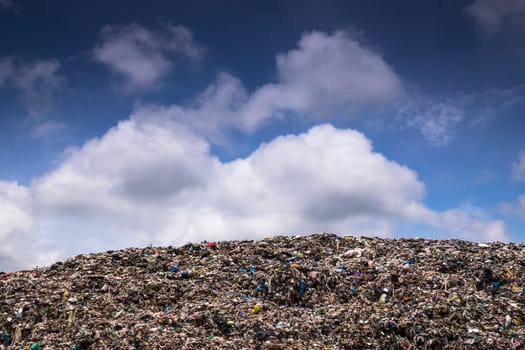 Landfill With Cumulus Clouds, landscape with garbage dump