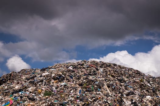 Landfill With Cumulus Clouds, landscape with garbage dump