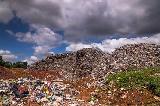 Landfill With Cumulus Clouds, landscape with garbage dump