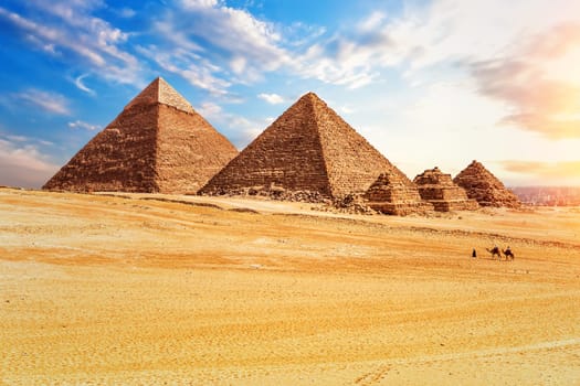 The Pyramids in the sunny desert of Giza, Egypt.