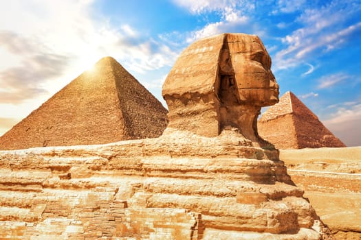 The Sphinx in front of the Pyramids, close view.