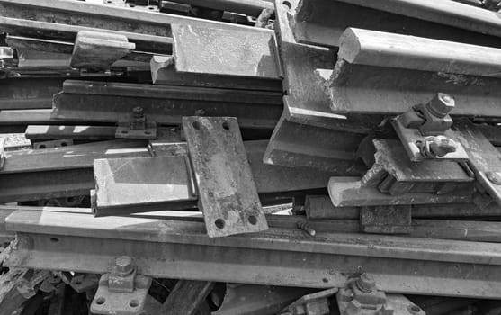 old rusty railroad tracks in black and white