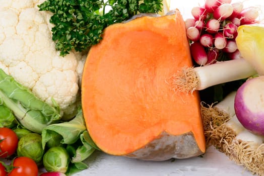 piece of pumpkin with different vegetables
