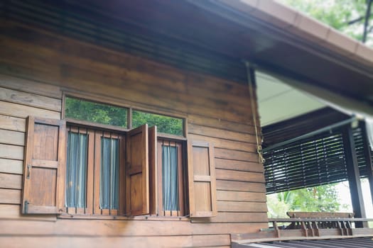 Beautiful Thai vintage style house and tropical garden, stock photo