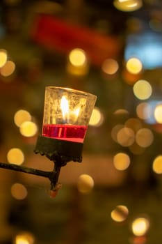 Red candles in clear glass. Candles in glass. Candles decorate in house..