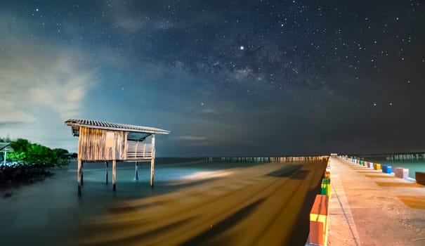 Old wooden house, no longer living in the sea, no way up the house Taken with the Milky Way as the back ground...