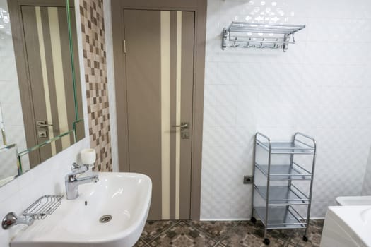 Interior of large bathroom, entrance view