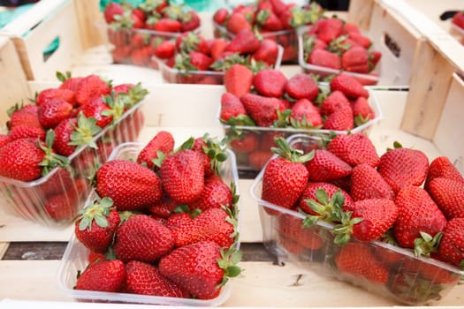 fresh strawberries for sale in a street market