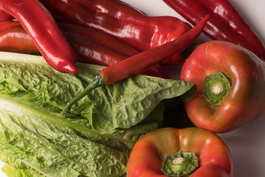 Organic Red Chili, Snack and Bell Pepper and Green Romaine lettuce, Close up and background