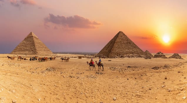 Sunset panorama of the Great Pyramids of Giza, Egypt.