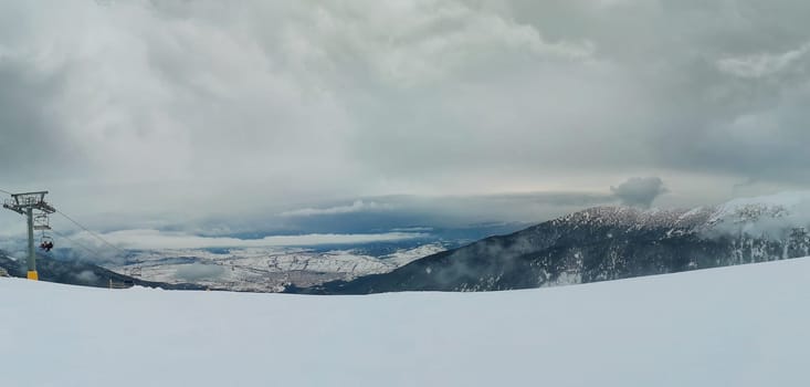 Bansko resort panoramic view with ski slope, view from the top of the mountain, Bulgaria.