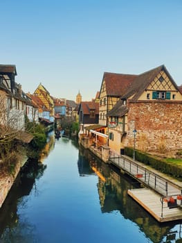 Colorful romantic city Colmar, France, Alsace. Traditional houses near the river. Medieval home facade, historic town. Beautiful idyllic architecture.