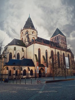 Saint Thomas church in Strasbourg, gloomy cloudy morning. Protestant cathedral, gothic architecture style. Strasbourg, Alsace, France