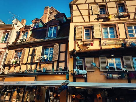 Colorful wooden building facade in Colmar city, France, Alsace. Historic town traditional house. Medieval architecture.