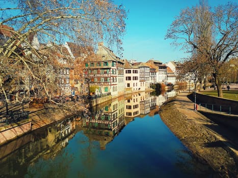 Traditional half-timbered houses on picturesque canals in La Petite France, the medieval fairytale town of Strasbourg, UNESCO World Heritage Site, Alsace, France.