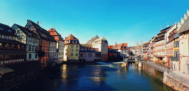 Traditional half-timbered houses on picturesque canals in La Petite France, the medieval fairytale town of Strasbourg, UNESCO World Heritage Site, Alsace, France.