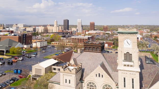 Soft white clouds appear after rain stoem in downtown Akron, Ohio