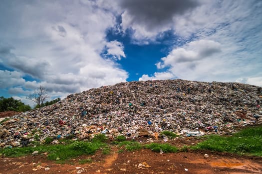 Garbage Dump Hill, landscape with landfill and clouds