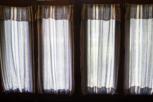 Cotton curtain decorative old window, stock photo