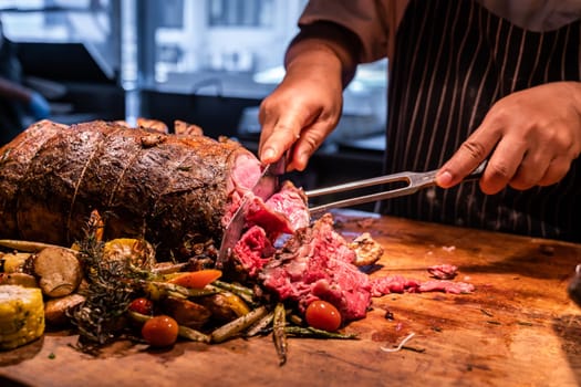 Chef cut Wagyu beef roast prime rib, Carving food