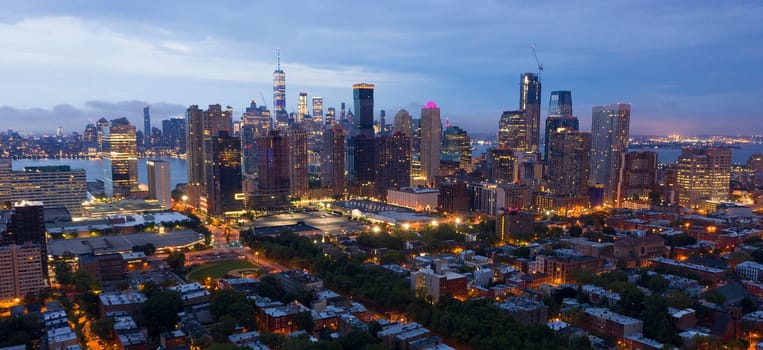 It's hard to tell where Jersey City and and Manhattan begins before sunrise