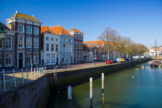 ZIERIKZEE, THE NETHERLANDS - APRIL 11, 2019: Old houses in the small city Zierikzee on the former island Schouwen in Zeeland province, the Netherlands.
