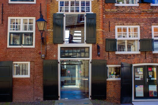 ZIERIKZEE, THE NETHERLANDS - APRIL 11, 2019: Old house in the small city Zierikzee on the former island Schouwen in Zeeland province, the Netherlands.