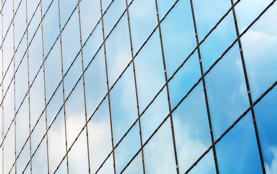 Windows of modern office building. Industrial architectural background.