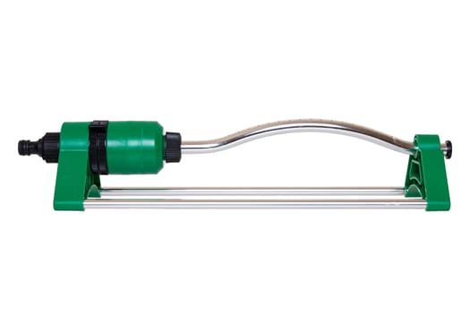 Equipment for watering garden. Closeup of a automatic sprinkler for irrigation of lawn or grass isolated on a white background.