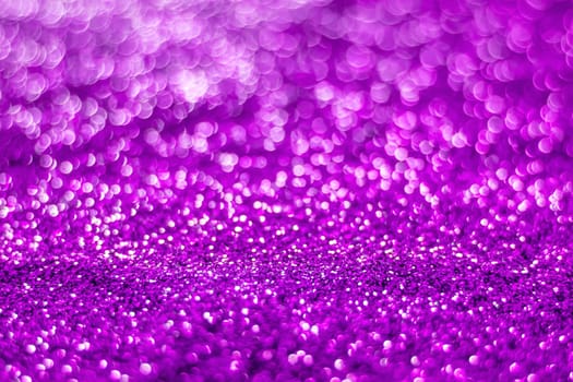 Glitter light abstract purple bokeh christmas light blurred background