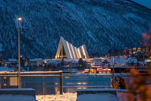 Tromso, Norway -  December 2018 : Tromso Harbour and Arctic Cathedral at night