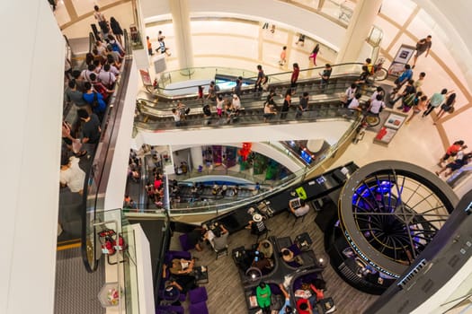 Bangkok, Thailand, March 2013 Modern interior of Siam Shopping Mall. Siam is one of the most popular shopping centers in Bangkok also has Madame Tusnads wax museum, Ocean World and cinema complex