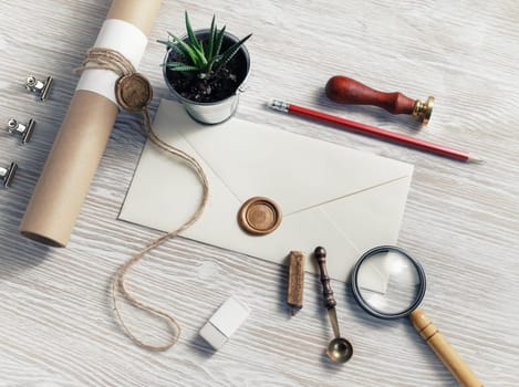 Vintage stationery set on light wood table background.