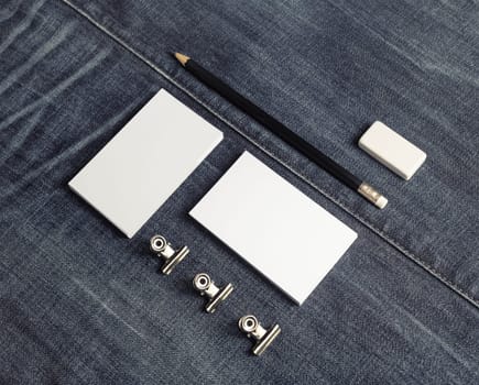 Blank business stationery set on denim background. Copy space for placing your design.