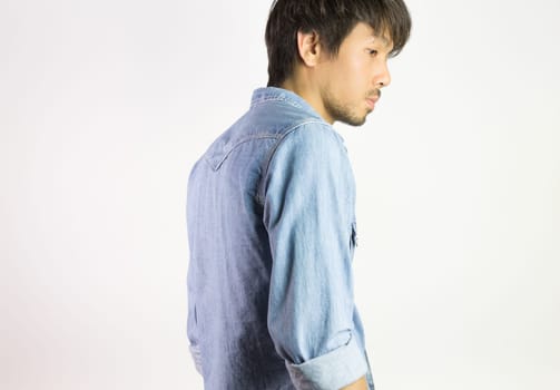 Portrait Man in Jeans Shirt or Denim Shirt Fashion in Side and Back View. Jeans shirt or denim shirt fashion for men on grey background