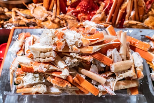 Alaskan King crab in seafood on ice buffet bar