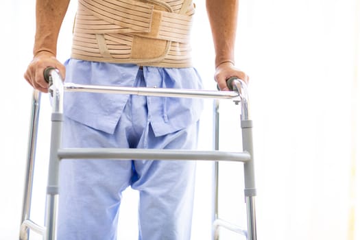 closeup of  elderly using adult walker in hospital