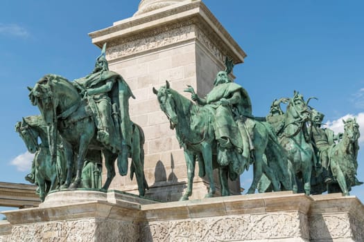 Budapest, Hungary - July 04, 2019: Heroes Square with Millenium Memorial and the horseman Memorial is one of the major squares in Budapest. Panorama with tourists and visitors.