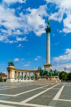 Budapest, Hungary - July 04, 2019: Heroes Square with Millenium Memorial and the horseman Memorial is one of the major squares in Budapest. Panorama with tourists and visitors.
