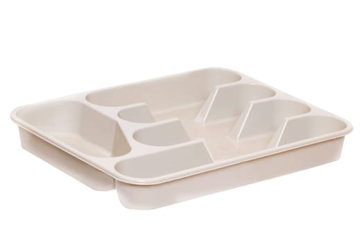 Empty plastic box background. Closeup of a beige plastic container for cutlery isolated on a white background. Macro.