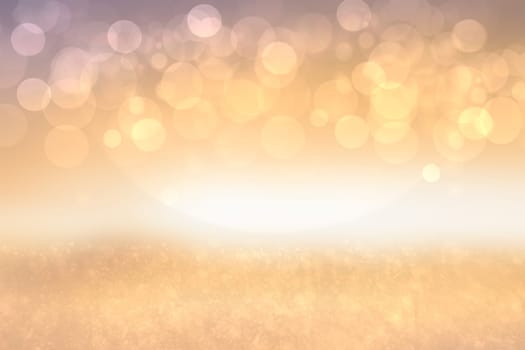 A festive abstract golden pink gradient background texture with glitter defocused sparkle bokeh circles. Card concept for Happy New Year, party invitation, valentine or other holidays.