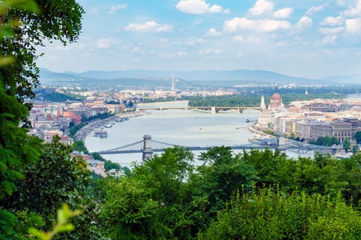 Panorama of Budapest over the Danube river. The bridges destroyed in World War II touch the two parts of the city Buda and Pest. The bridges stand out for their majesty and elegance.