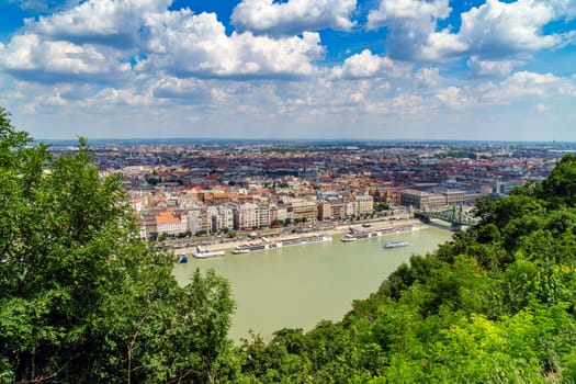 Panorama of Budapest over the Danube river. The bridges destroyed in World War II touch the two parts of the city Buda and Pest. The bridges stand out for their majesty and elegance.