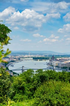 Panorama of Budapest over the Danube river. The bridges destroyed in World War II touch the two parts of the city Buda and Pest. The bridges stand out for their majesty and elegance.