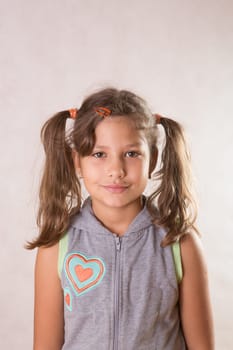 Cute little girl smiling looking