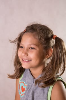 Cute little girl smiling looking
