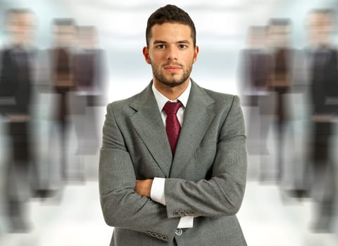 young handsome business man portrait at the office