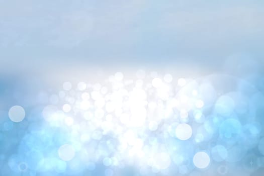 Abstract ocean background. Abstract bright tropical ocean with sun and blue cloudy sky. Backdrop for summer holidays and travel advertising.