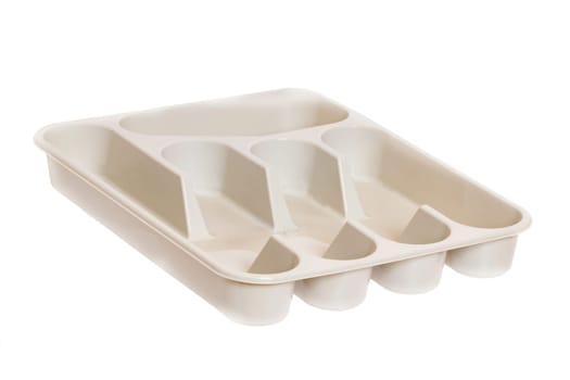 Empty plastic box background. Closeup of a beige plastic container for cutlery isolated on a white background. Macro.
